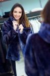 Beautiful Young Woman Shopping In A Clothes Shop Stock Photo