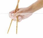 Hand Holding Chopstick Stock Photo