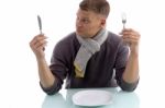 Young Man Looking The Fork Stock Photo