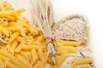 Italian Pasta Penne With Wheat Stock Photo