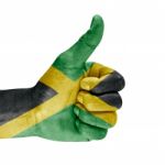 Flag Jamaica On Hand Stock Photo