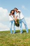 Couple Pointing At Stock Photo