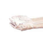 Woman Washes Her Hands. Pictured Female Hands In Soapsuds. Isola Stock Photo