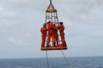 Transfer Crews By Personal Basket From The Platform To Crews Boat Stock Photo