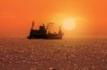 Fishing Boats Floating In The Sea Stock Photo