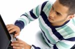 Teenager Guy Working On Laptop Stock Photo