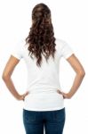 Back Pose Of Stylish Young Woman Stock Photo