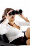 lady Looking Through Binocular Stock Photo