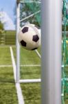 Football Between Goalposts Stock Photo