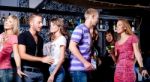 Young Couple In Night Club Stock Photo