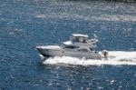 A Motorboat Rapidly Cruising The Straits Between Victoria And Va Stock Photo