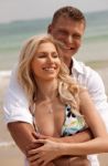 Smiling Romantic Couple At Beach Stock Photo