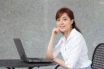 Portrait Of Thai Adult Businesswoman Beautiful Girl Using Computer Notebook Stock Photo