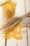 Italian Pasta Penne With Wheat Stock Photo