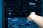 Man Fix Server Network In Data Center Room Stock Photo