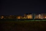 Night Public Park In The City With Houses Near Stock Photo