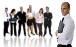 Young Businessman With Folder And Group Stock Photo