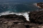 Waves Crashing On The Rocks L Stock Photo