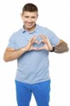 Male Showing Heart Shape Gesture Stock Photo