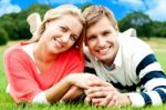 Smiling Young Couple In Outdoor Stock Photo