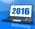 Two Thousand And Sixteen On Laptop Shows Year 2016 Stock Photo