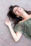 Portrait Of Young Girl Listening To Music Stock Photo