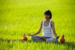 Girl Practicing Yoga Stock Photo