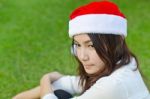 Beautiful Young Santa Clause Woman Stock Photo