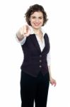 Woman In Formals Pointing Forward Stock Photo