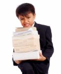 Boy With Lots Of  Books Stock Photo