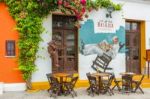 Picturesque Facade Of Pizza Place At Plaza Del Pozo, Well Plaza, Stock Photo