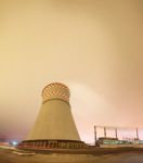 Thermal Power Plant And Cooling Towers At Night Stock Photo