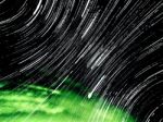 Star Trails In Dark Night Stock Photo