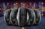 Car Tires In Row On The Street Stock Photo