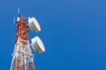 Telecommunication Tower On Blue Sky Background Stock Photo