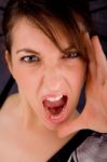 Front View Of Shouting Young Woman Stock Photo