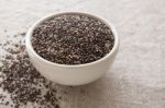 Chia Seeds In White Bowl Stock Photo