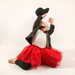 Little Girl Fashion Model With Black Hat Stock Photo