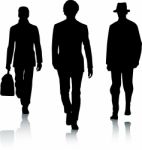 Silhouette guys walking Stock Photo