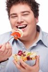 Chubby Man With Fresh Salad Stock Photo