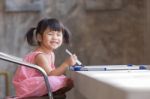 Lovely Face Of Toothy Smiling Asian Children Practive To Writing Stock Photo