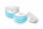 Two Blue Triangle Cosmetic Jar On White Background Stock Photo