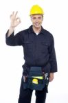 Young Worker Showing Good Gesture Stock Photo