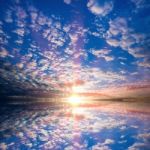 Sky With Clouds With Reflection Stock Photo