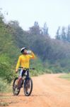 Young Bicycle (cyclist) Man Drinking Fresh Water From Plastic Bo Stock Photo