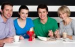 Family Enjoying Dinner Stock Photo