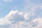 Light Blue Sky With White Close-up Clouds Stock Photo