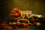 Two Glasses Of Champagne With A Christmas Decor In The Background Stock Photo