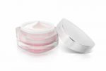 Pink Triangle Cosmetic Jar On White Background Stock Photo