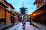 Asian Woman Wearing Japanese Traditional Kimono At Yasaka Pagoda And Sannen Zaka Street In Kyoto, Japan Stock Photo